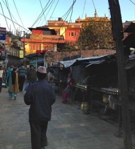 Walking back from Peak Hour Prayer at Bodhnath Stupa